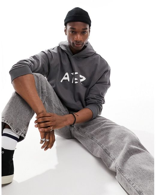 Asos Design oversized hoodie with cut out text print charcoal