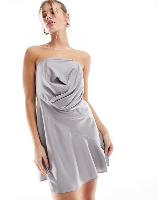 Asos Design satin bandeau asymmetric hem mini dress with ruched bodice detail