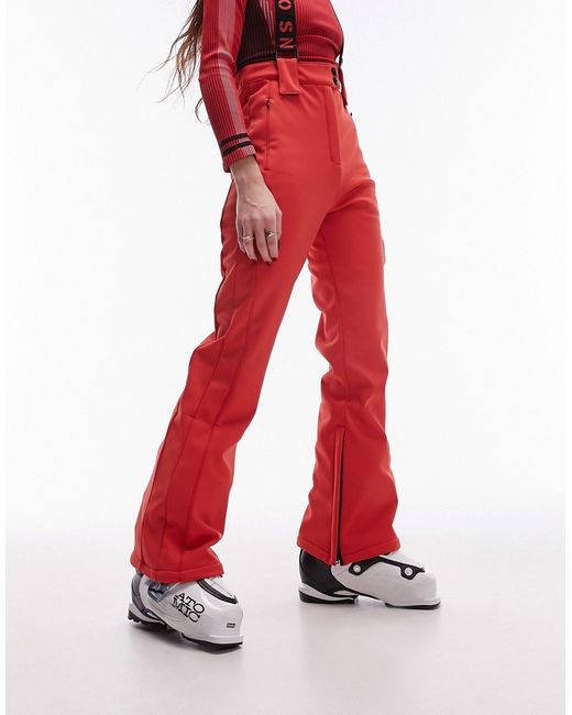 TopShop Sno flared ski pants with suspenders red-
