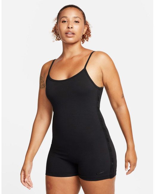 Nike one piece jumpsuit with tape detail