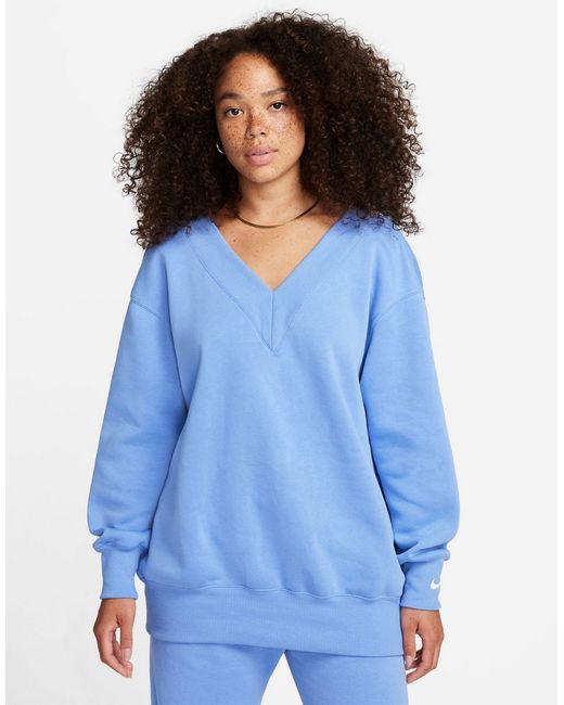 Nike Mini Swoosh v neck sweatshirt polar blue-
