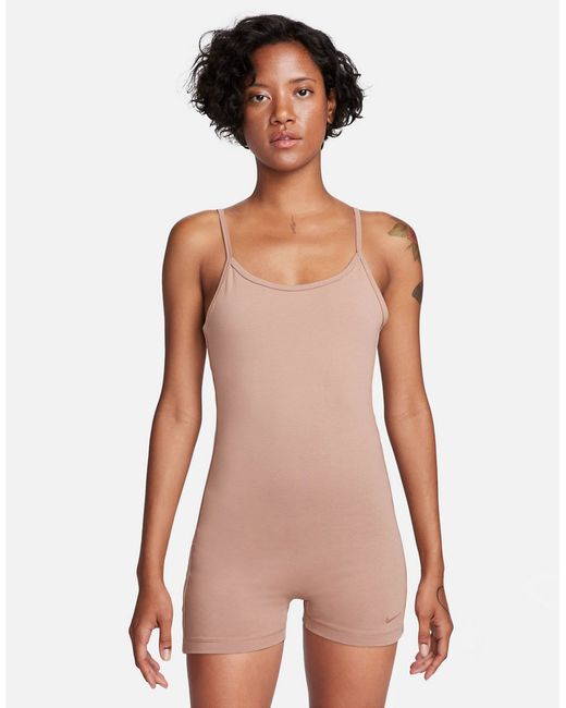 Nike one piece jumpsuit with tape detail beige-