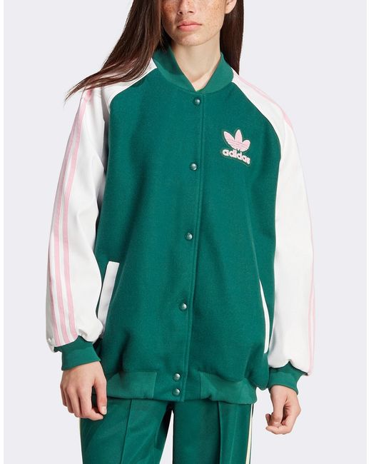 Adidas Originals Superstar varsity jacket with pink detail collegiate