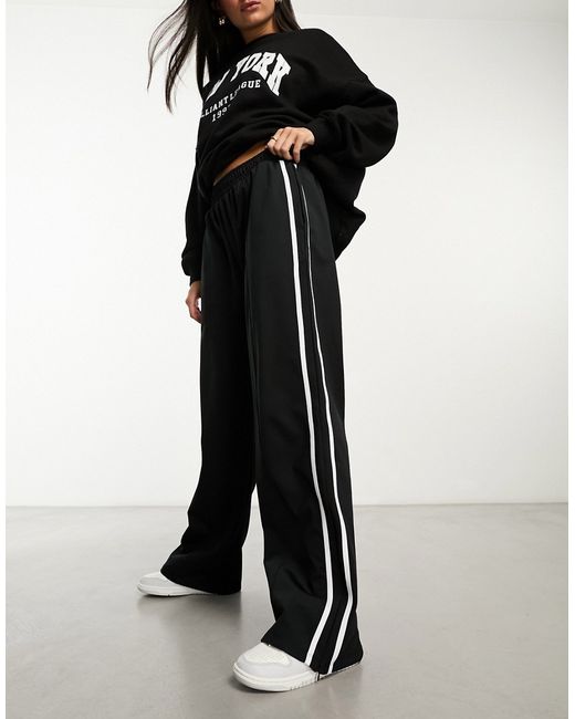 Asos Design wide leg sweatpants with side stripe