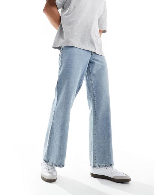 Asos Design wide flared jeans mid wash