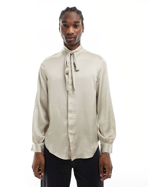 Asos Design satin shirt with tie neck and blouson volume sleeve champagne-