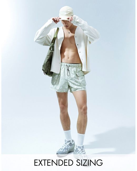 Asos Design swim shorts short length with camo print khaki-