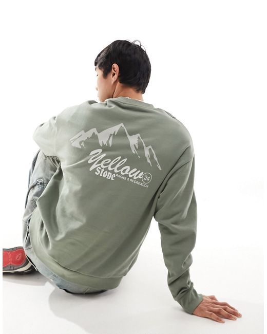 Asos Design oversized sweatshirt with mountain back print