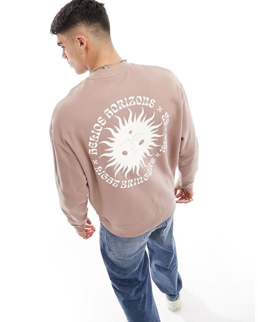 Asos Design oversized sweatshirt with sun back print