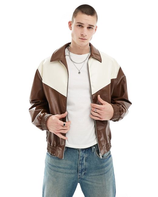 Asos Design oversized faux leather bomber jacket with cut and sew detail