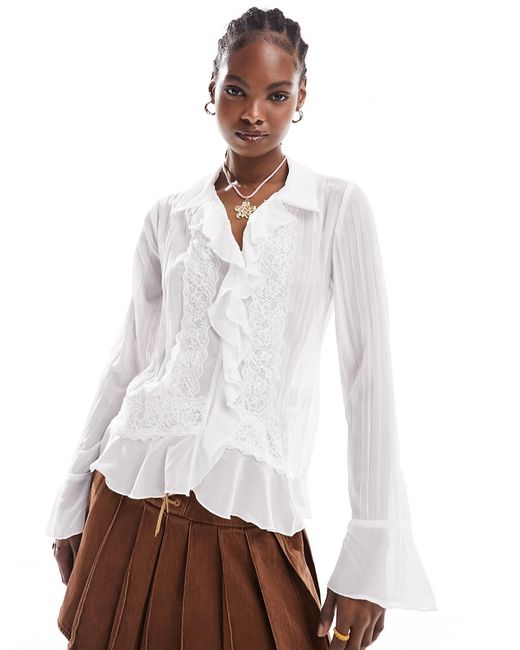 Free People lace and ruffle edged blouse ivory-