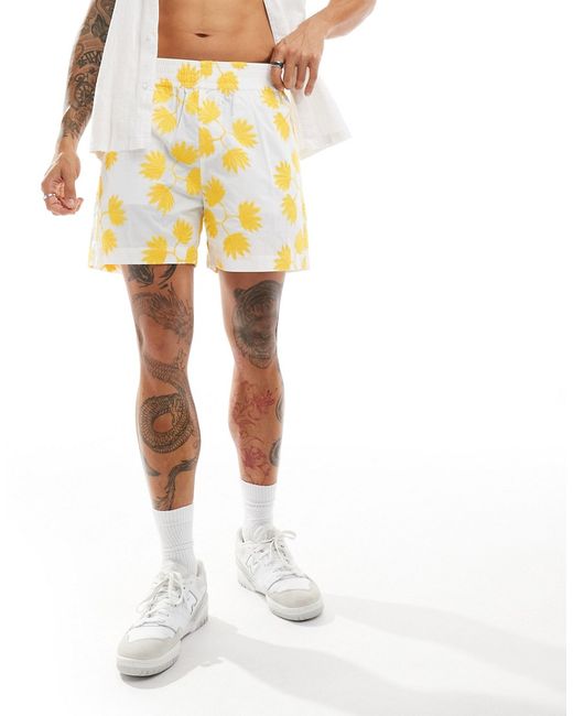 Asos Design wide shorts with yellow flower embroidery