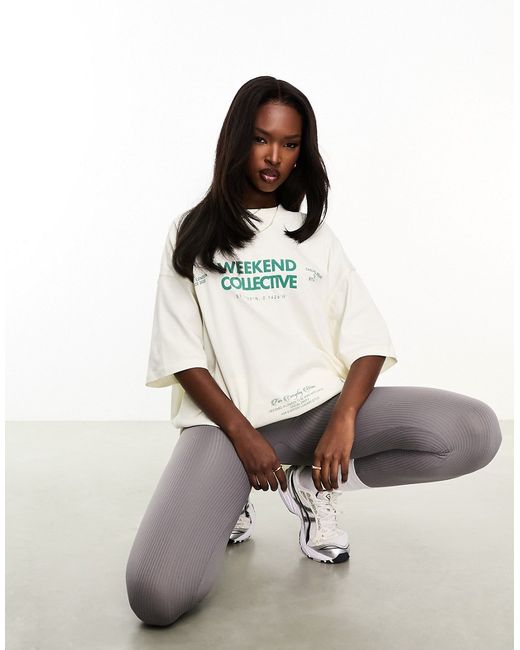 ASOS Weekend Collective oversized t-shirt with graphic ecru and green-