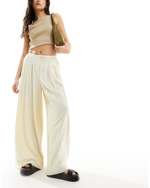 Asos Design pleated palazzo wide leg pants with linen cream-