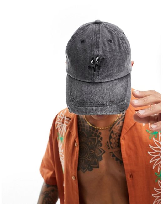 Asos Design baseball cap with cartoon embroidery washed