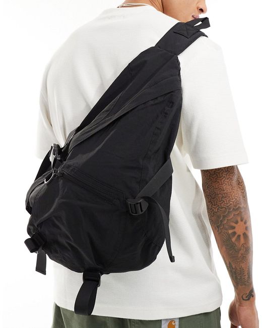 Asos Design large sling backpack bag