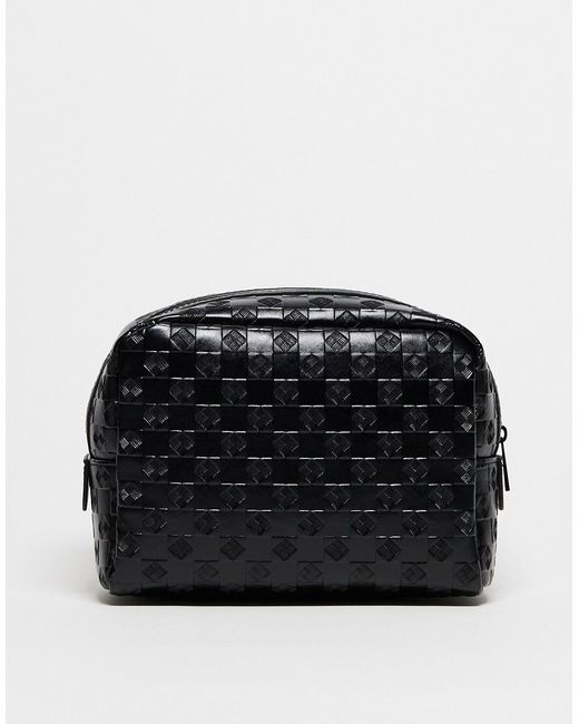 Asos Design faux leather toiletry bag with embossed checkerboard design