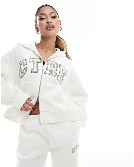 The Couture Club varsity zip up hoodie off part of a set
