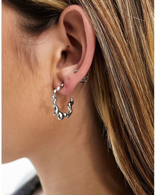 Asos Design 25mm hoop earrings with molten design tone