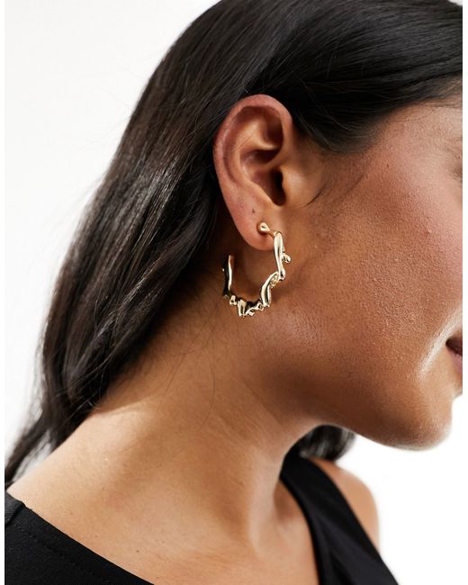 Asos Design hoop earrings with molten design tone