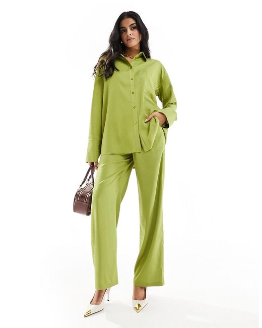 4th & Reckless satin wide leg pants lime part of a set-