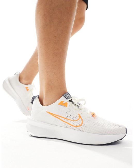 Nike Running Interact Run sneakers off and orange