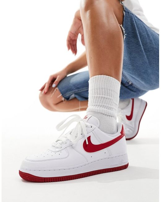 Nike Air Force 1 sneakers and red