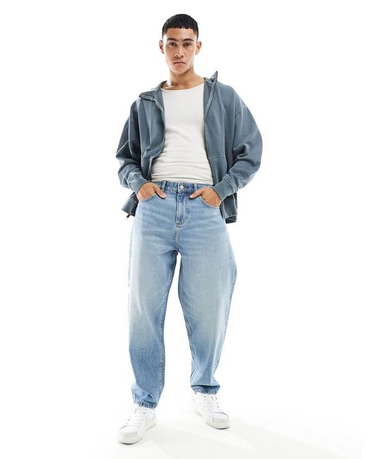 Asos Design oversized tapered jeans mid wash
