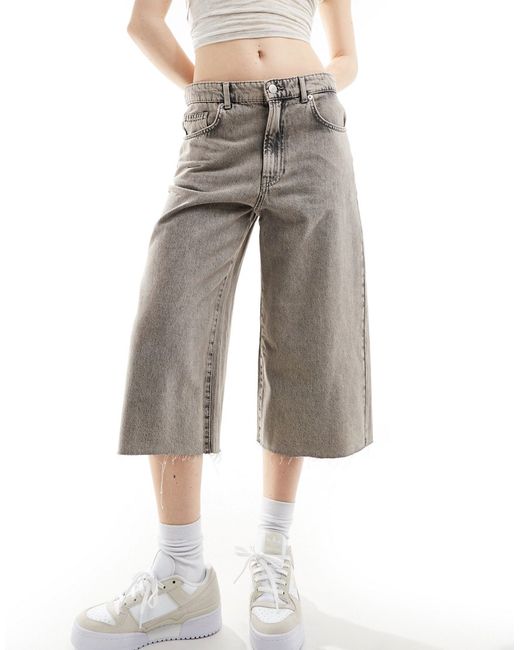 Pull & Bear longline denim shorts with raw hem washed