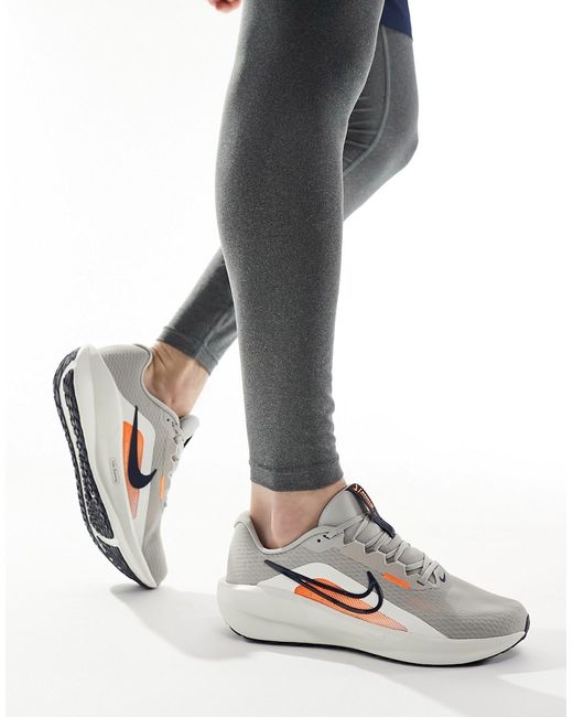 Nike Running Downshifter sneakers and orange