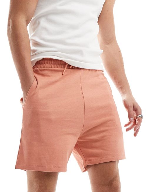 Asos Design slim fit shorts peach-