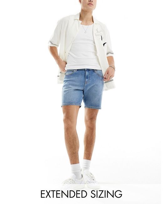 Asos Design skinny mid length denim shorts wash