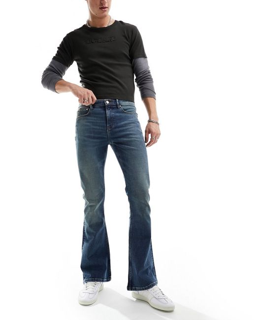Asos Design flared jeans tinted wash
