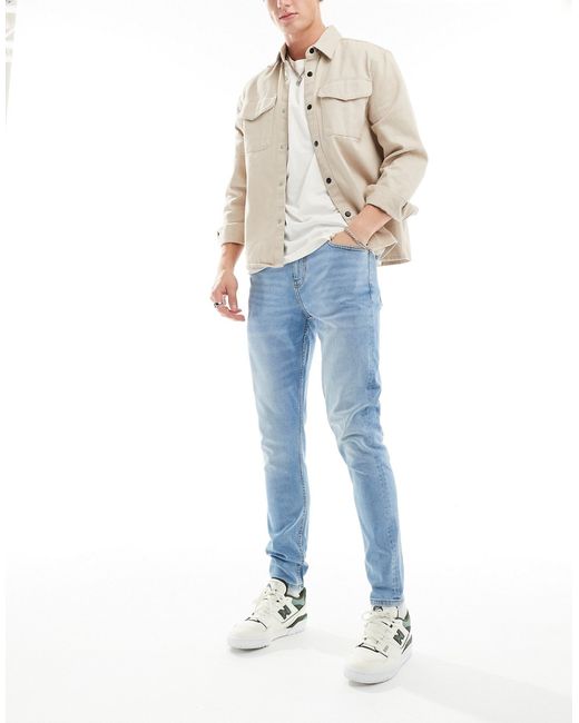 Asos Design skinny jeans pale vintage