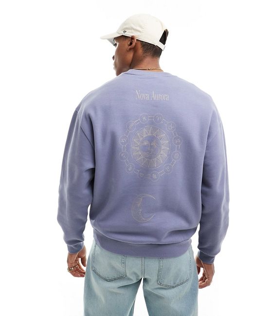 Asos Design oversized sweatshirt blue with spine print-