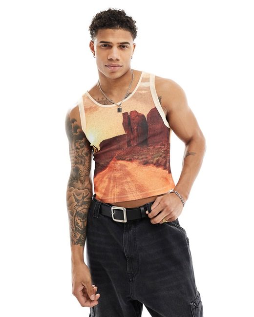 Asos Design muscle fit tank top with scenic all over print-