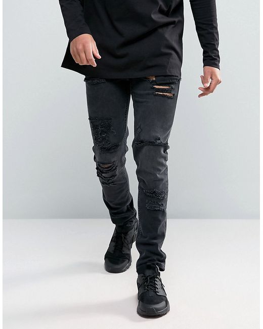 Asos Design skinny jeans 12.5oz with mega rips washed