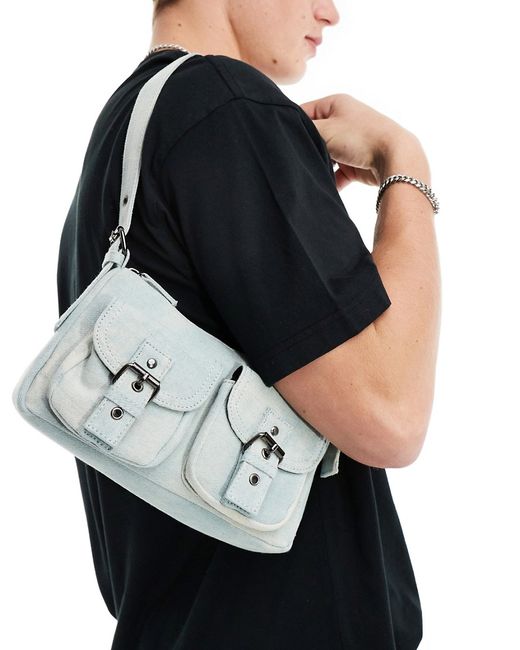 Asos Design shoulder bag with pockets and buckles washed denim-