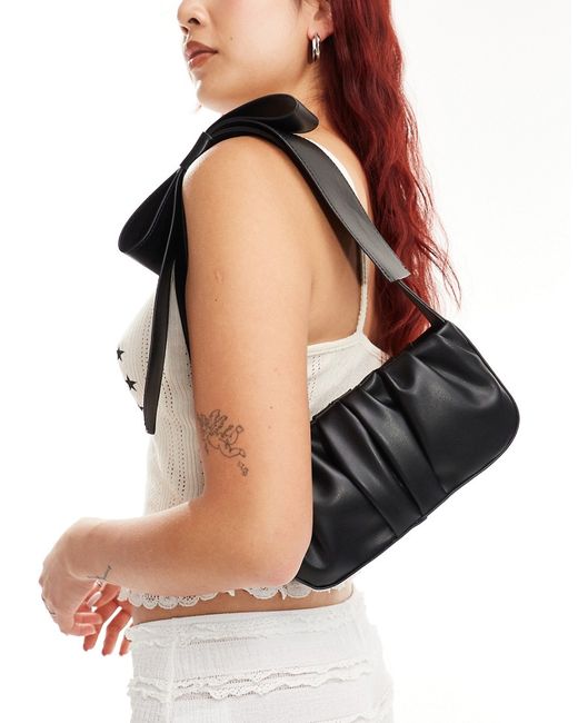 Asos Design ruched shoulder bag with large bow strap
