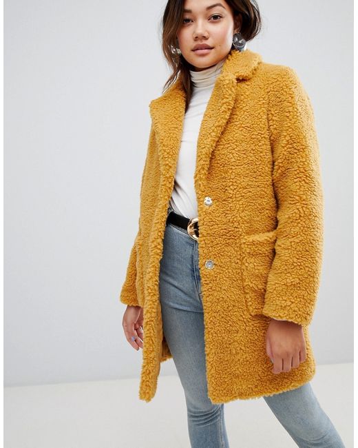 New Look teddy fur coat in mustard
