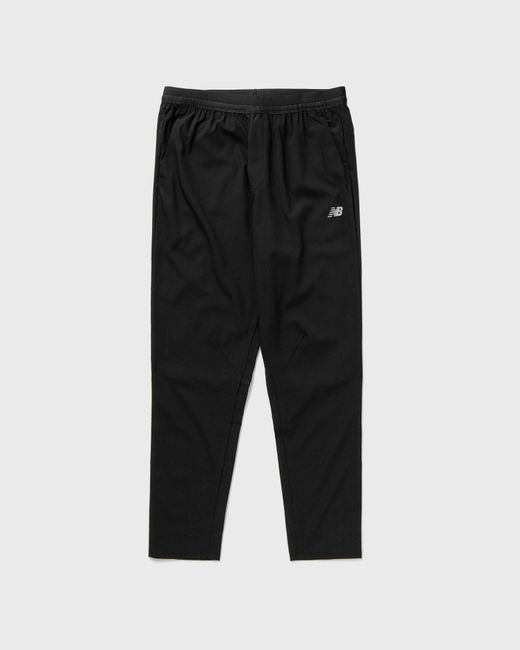 New Balance AC Stretch Woven Pant Regular male Track Pants now available