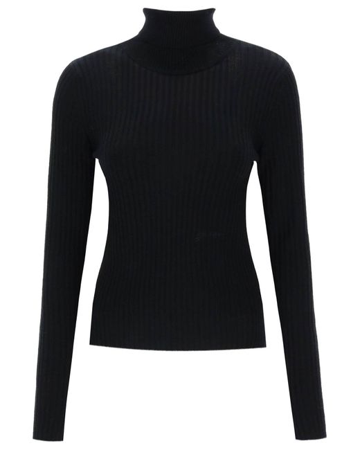 Ganni Turtleneck sweater with back cut out