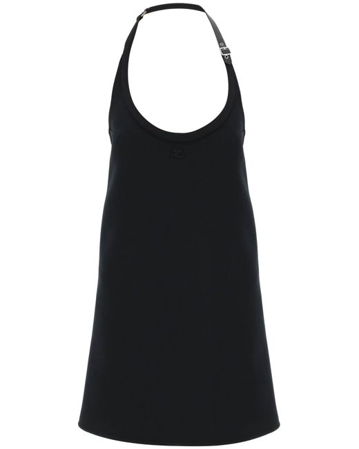 Courrèges Mini dress with strap and buckle detail.