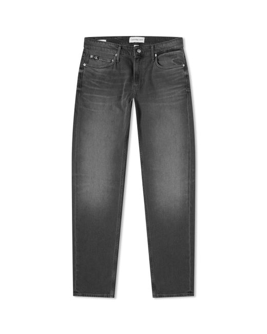 Calvin Klein Slim Taper Jeans in Small END. Clothing