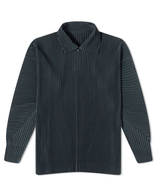 Homme Pliss Issey Miyake Pleated Polo Shirt in END. Clothing