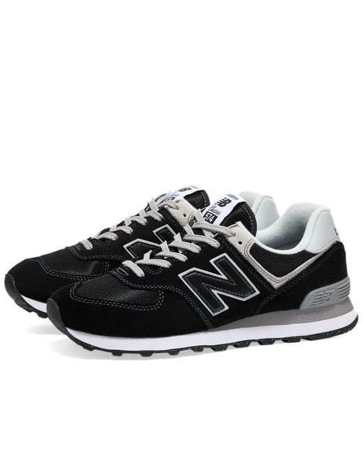 New Balance WL574EVB Sneakers in END. Clothing