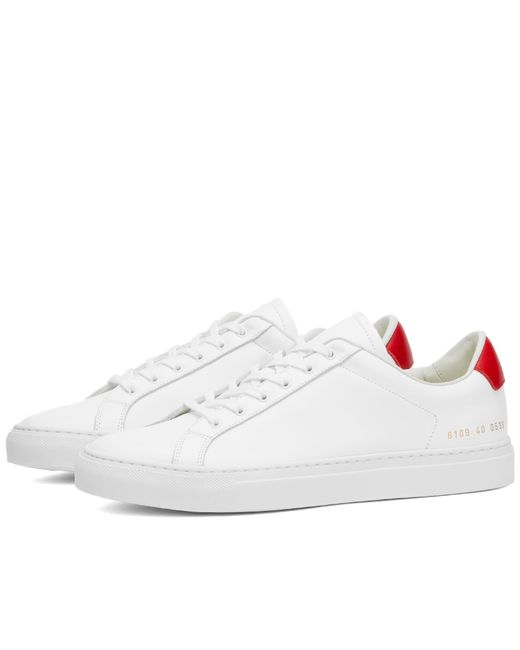 Woman By Common Projects Retro Low Sneakers in END. Clothing