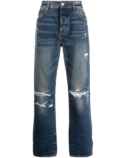 Amiri logo-patch ripped-detailing straight-leg jeans
