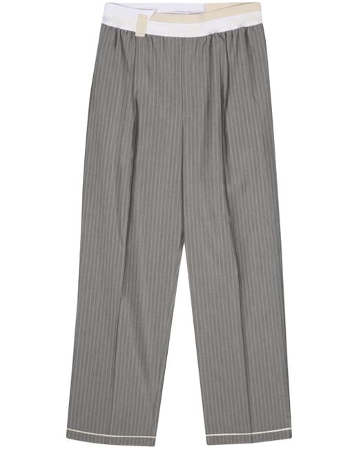 Magliano logo-detail wide-leg trousers