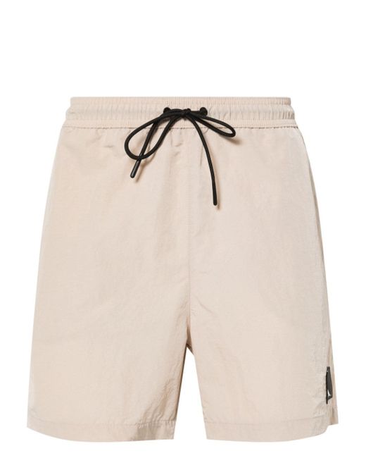 Calvin Klein logo-patch swim shorts
